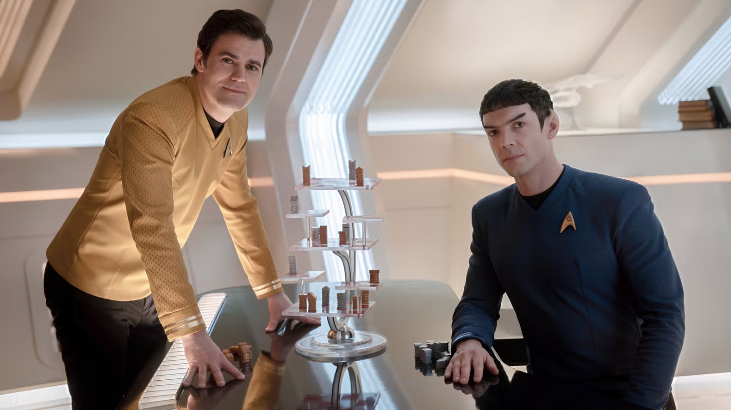 two male officers aboard a TV show starship