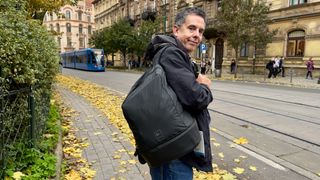 Man carrying a Gomatic McKinnon Cube Pack