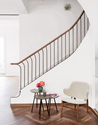 Simple staircase with retro style wall sconces
