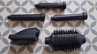 All the attachments for the Revamp Dynamic Radiance Pro hair styler laid out