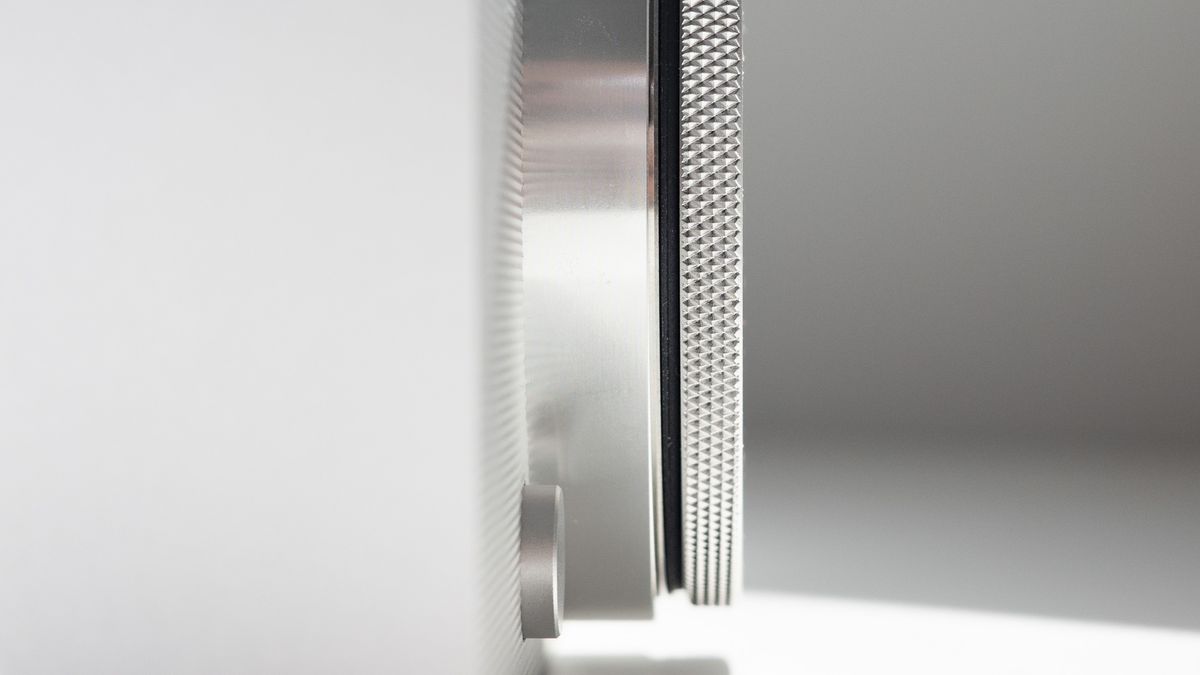 Sigma BF with its body cap, on a white surface in strong light, with defined shadows