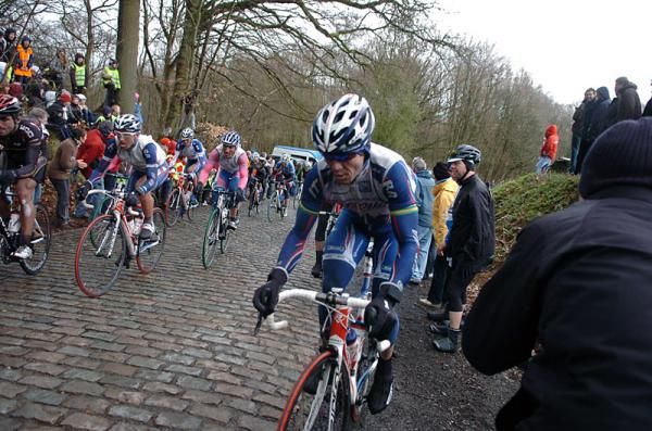 Robbie McEwen (Katusha) seeks relief from the cobbles.