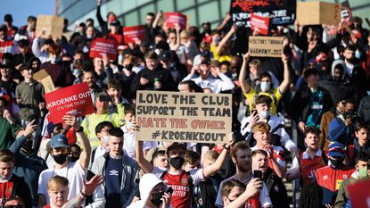 Arsenal fans protesting