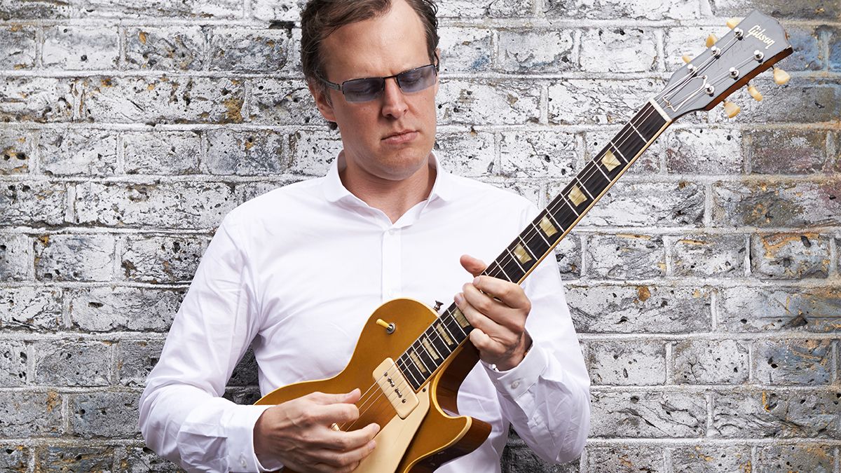 Portrait of American blues rock musician Joe Bonamassa photographed with a vintage 1952 Gibson Les Paul at John Henry&#039;s rehearsal space in London, on June 16, 2014. 