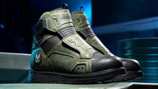 Green boots with iconography from the Halo series
