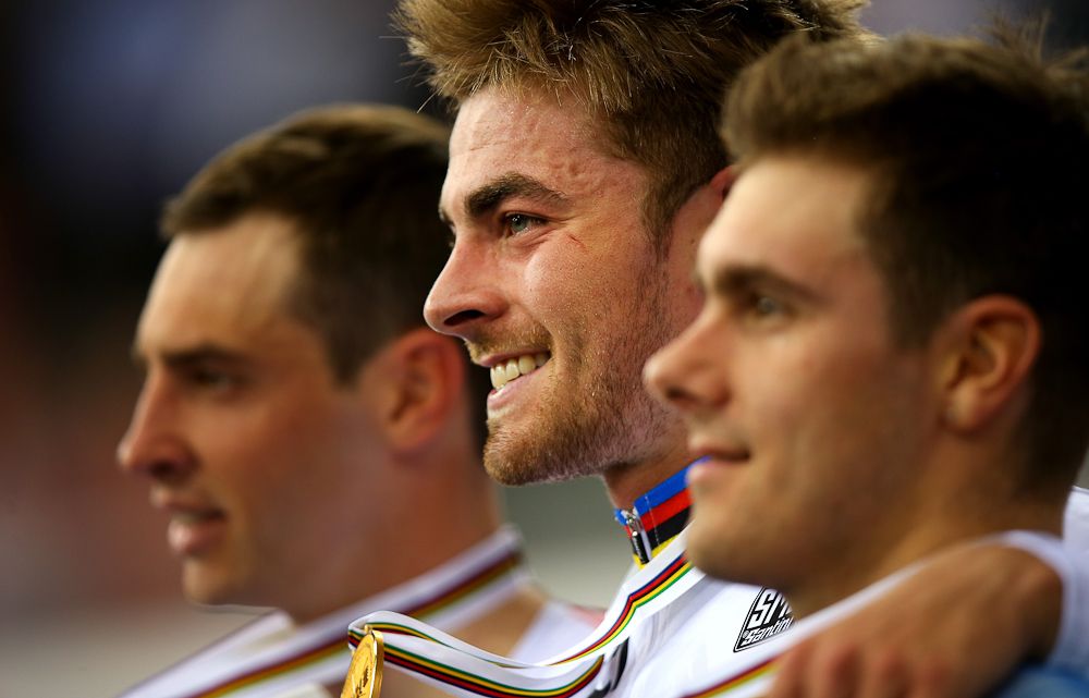 onathan Dibben of Great Britain celebrates his gold medal after winning the final of the Mens Points Race