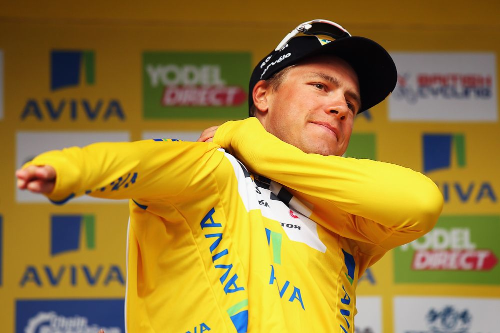 Edvald Boasson Hagen puts on the final yellow jersey at the Tour of Britain.