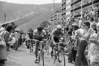 French cyclists Bernard Thevenet L and Raymond Poulidor R climb lAlpe dHuez encouraged by supporters on July 4 1976 during the 7th stage of the Tour de France DivonnelesBains LAlpe dHuez Photo by AFP Photo by AFP via Getty Images