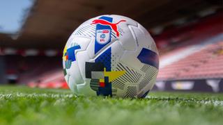 English Football League soccer ball on a pitch in a stadium