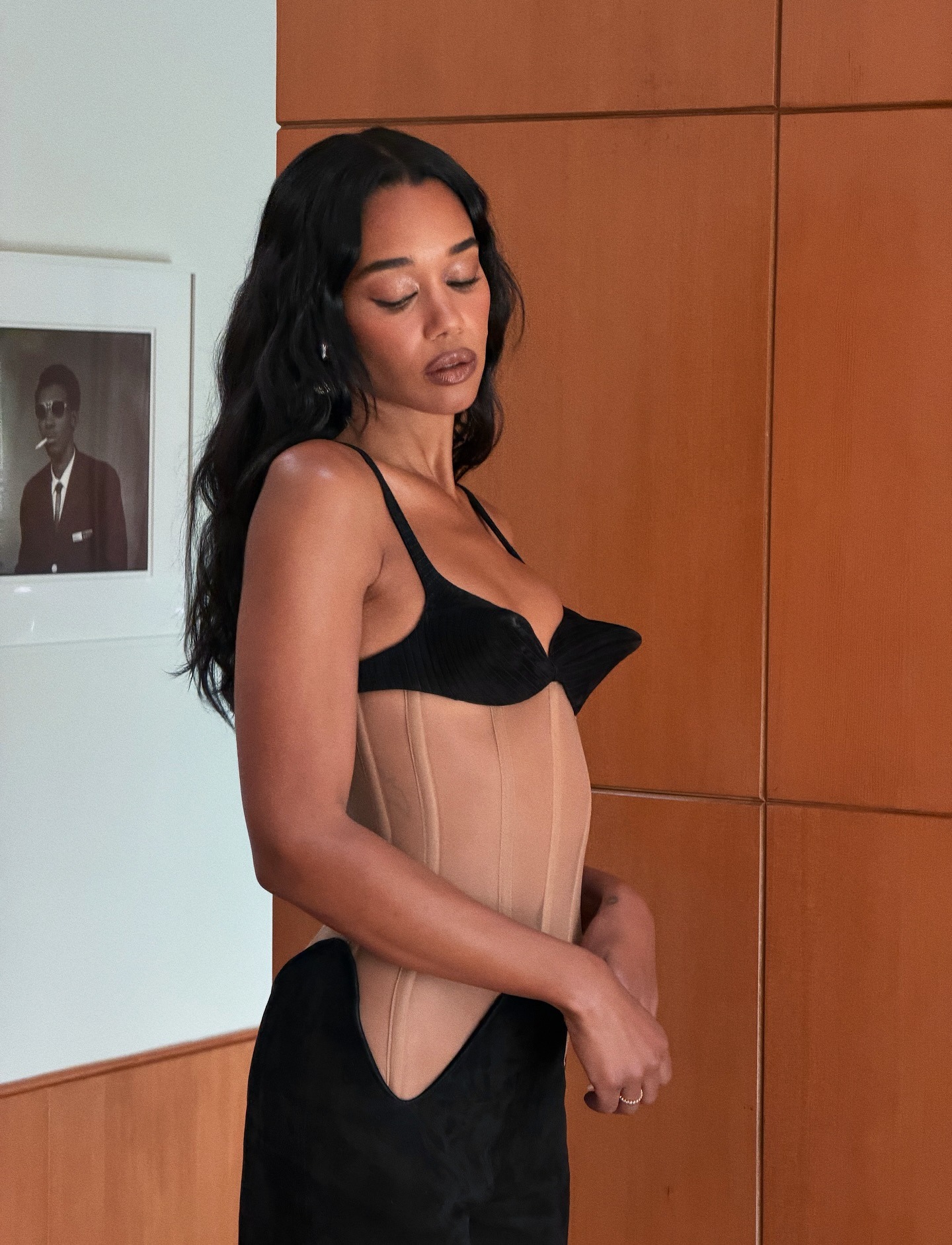 Laura Harrier with a wavy hairstyle