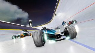 Best racing games - low angle view of race cars coming down a half pipe