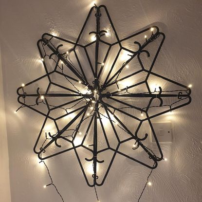 christmas decorations with wall hangers having twinkly fairy lights