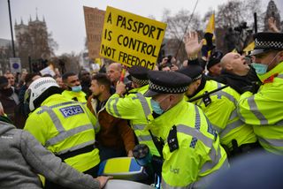 Police try and control anti-vax demonstration