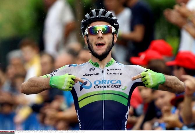 Adam Yates (Orica GreenEdge) lets the fans know which team he rides for