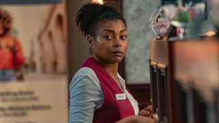 Janiyah looks concerned in the bank