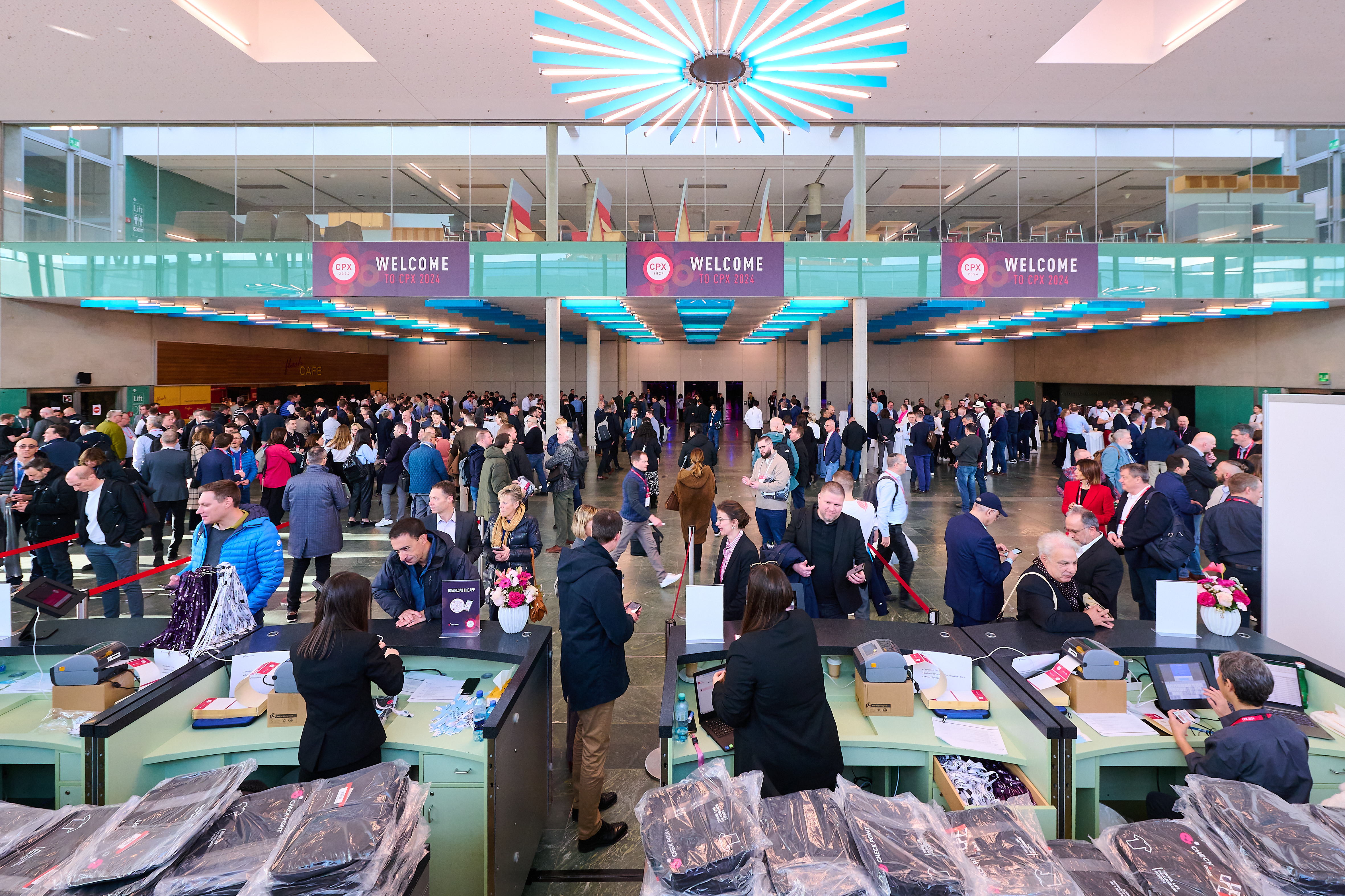 Conference lobby area full of attendees