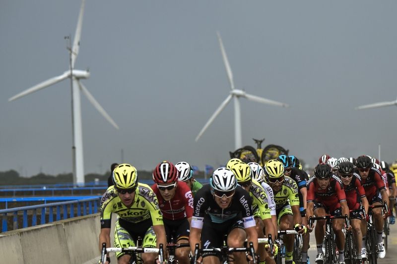 The peloton rides through the storm
