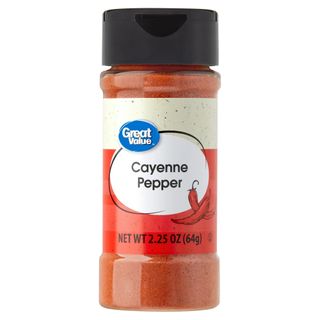 A plastic bottle of cayenne pepper with red and white label and black lid