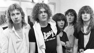 Def Leppard posing for a photograph backstage at a gig in 1981