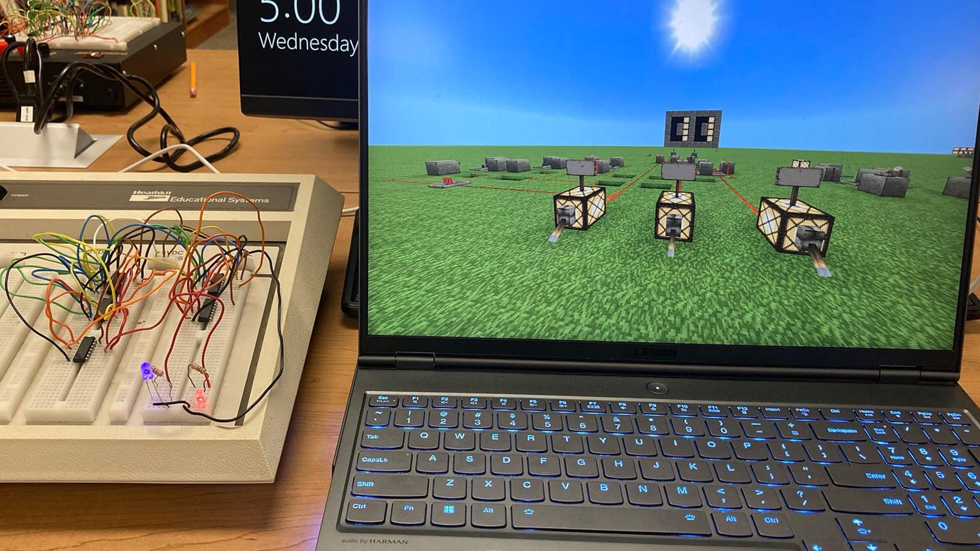 Various creations in Minecraft, including computers and calculators.