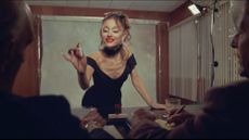A still from the Ariana Grande music video for "Petal"