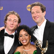 Jeremy Allen White, Liza Colón-Zayas, and Ebon Moss-Bachrach pose at the 76th Primetime Emmy Awards on September 15, 2024.