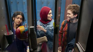 Kamala Khan and her friends Bruno and Nakia chat by their school lockers in Ms Marvel