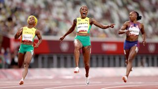 Elaine Thompson-Herah of Team Jamaica celebrates after winning the gold medal in the Women's 100m Final on day eight of the Tokyo 2020 Olympic Games at Olympic Stadium on July 31, 2021 in Tokyo, Japan.