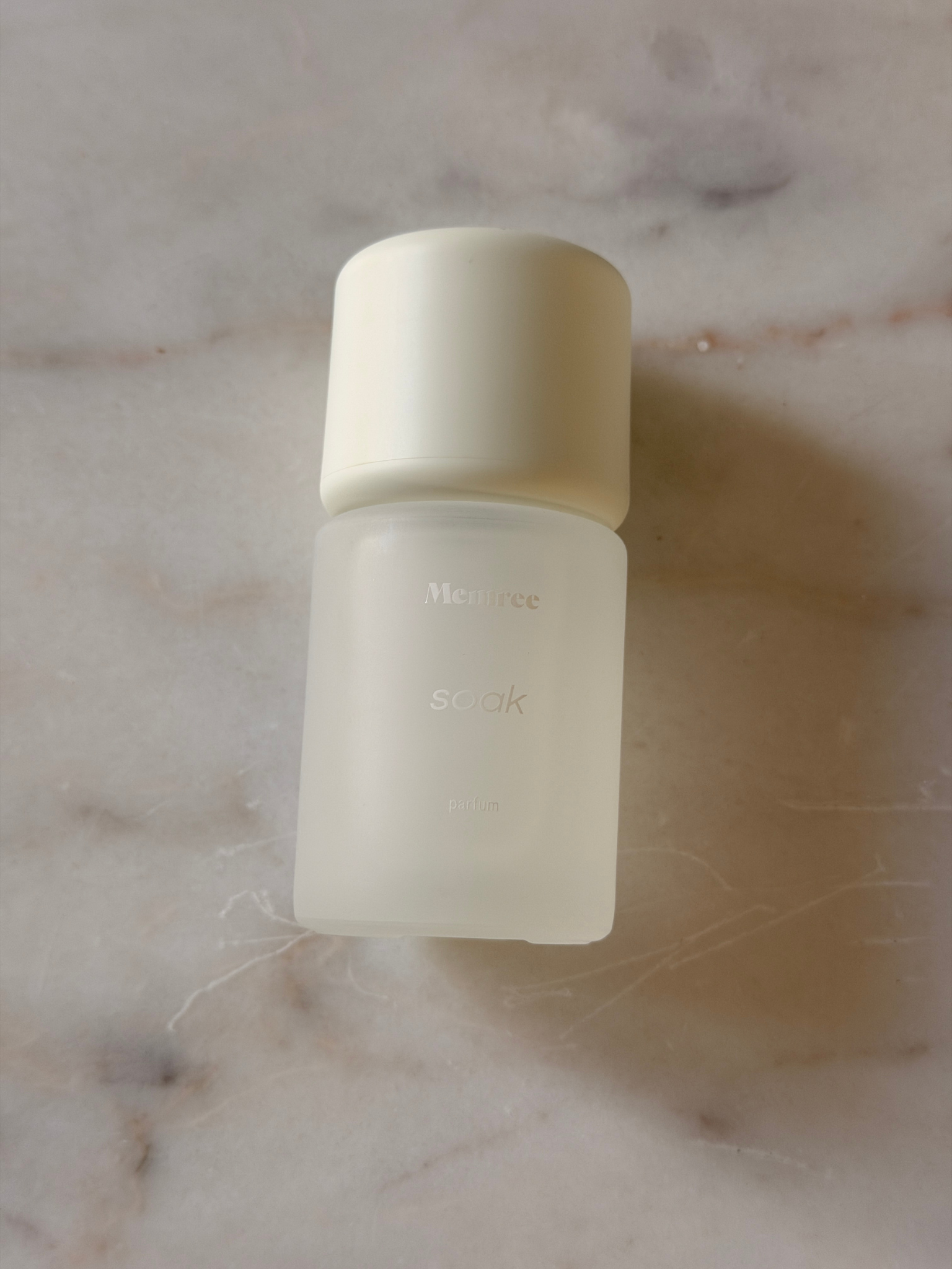 A bottle of Memree Soak