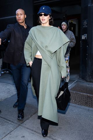 Kendall Jenner wearing a mint green coat in NYC