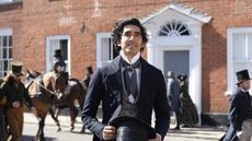 Actor Dev Patel in Victorian dress, in a film still for David Copperfield (2019)