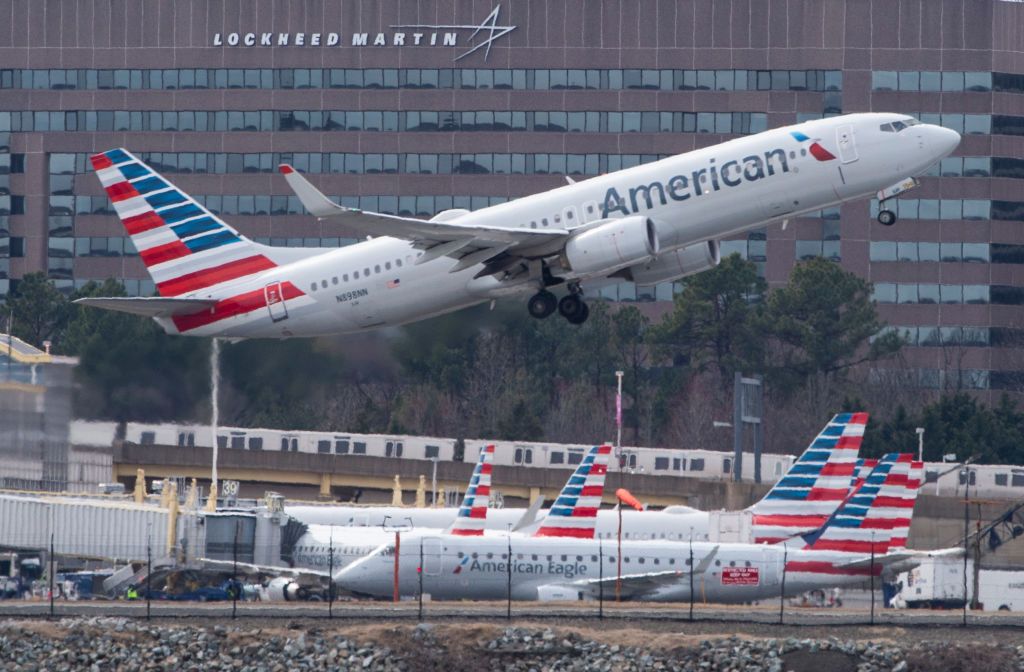 An American Airlines plane takes off.