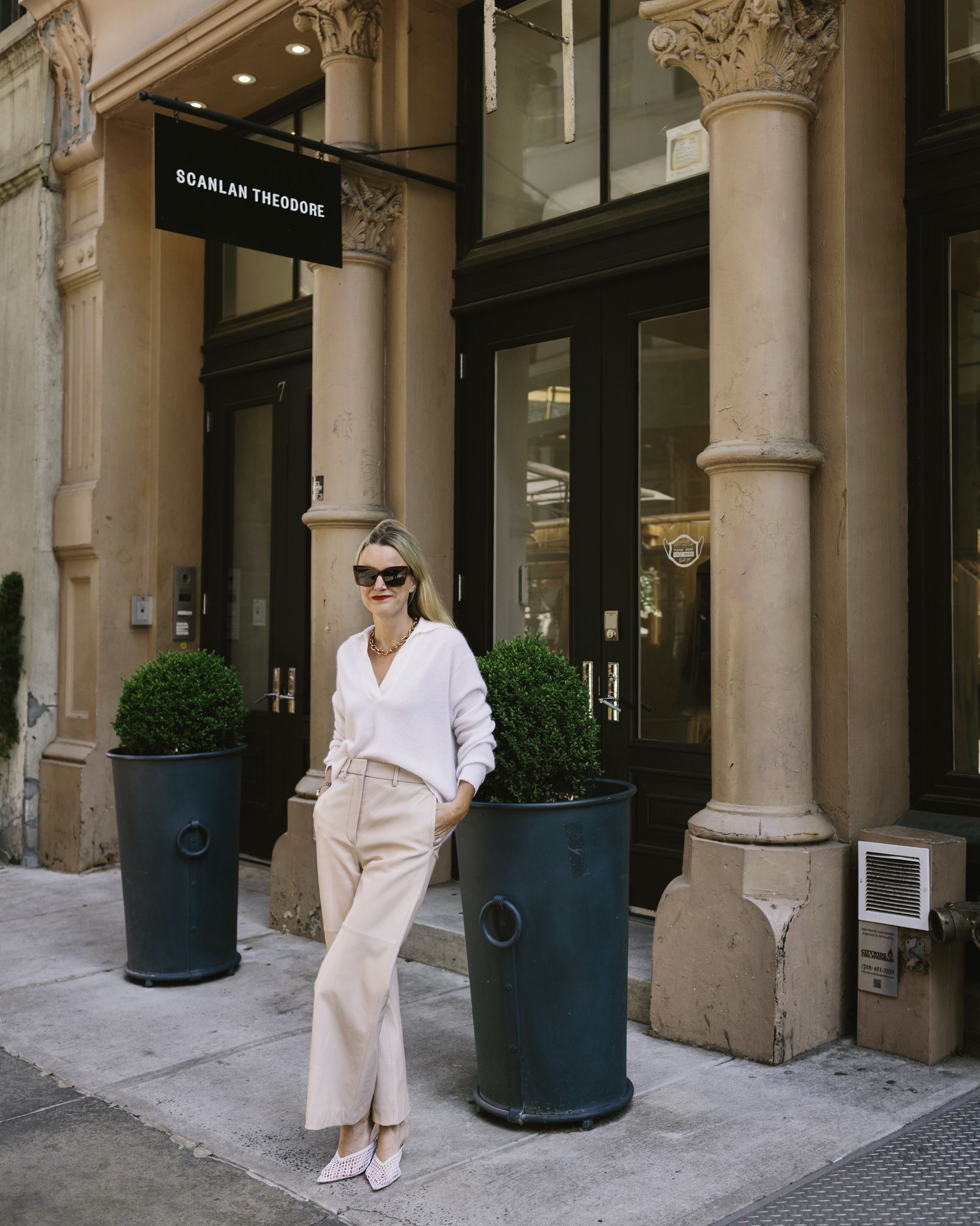 Robertson outside of the Scanlan Theodore boutique in her elevated basics workwear uniform.
