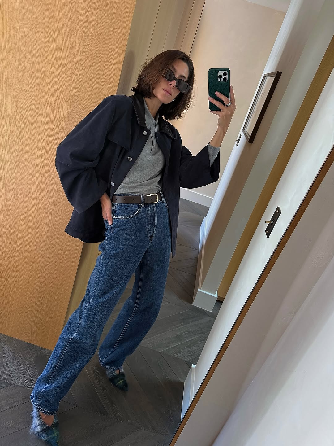 woman wearing gray sweater spring outfit 2026