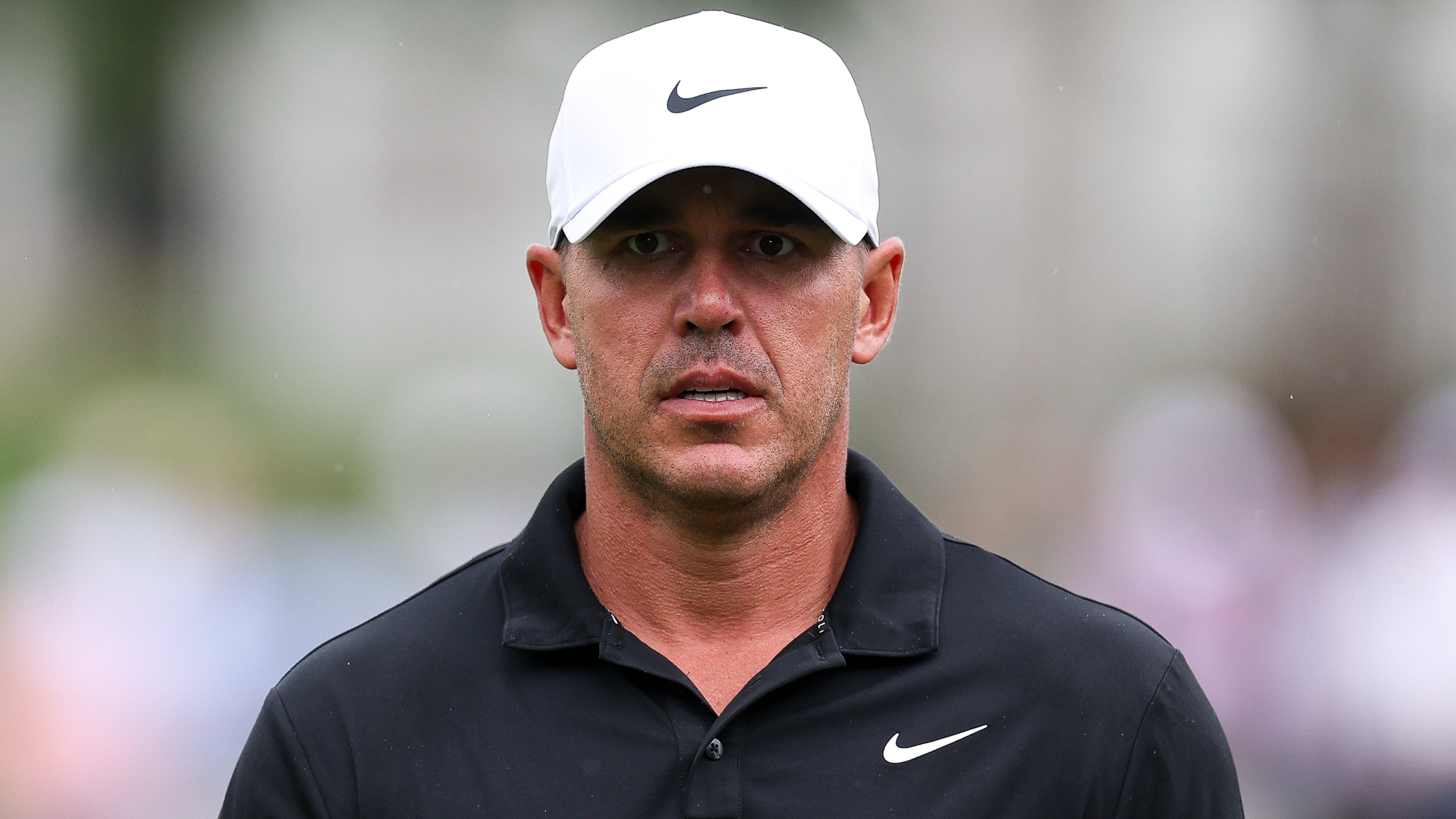 Brooks Koepka wearing a black shirt