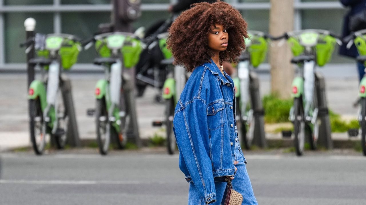 woman wearing oversized denim jacket