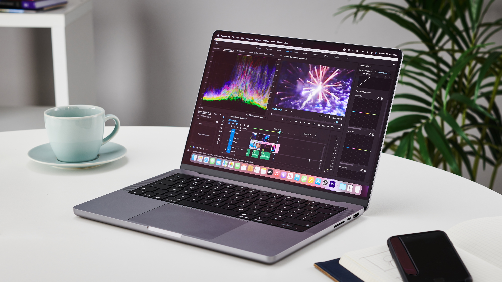 MacBook Pro 14-inch on a table in an office