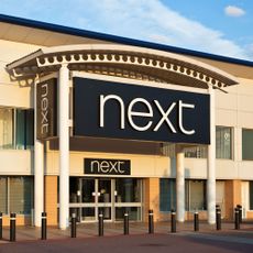 next store with glass door and road