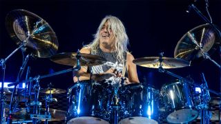 Mikkey Dee behind his kit onstage