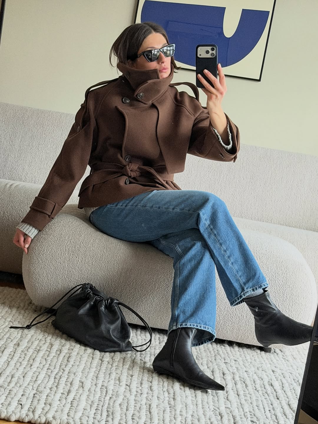 woman wearing winter denim outfit idea 2025