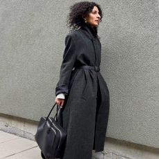 Influence anti-basic winter outfits: long coat, bag.