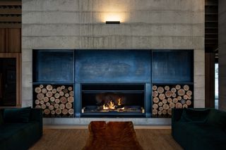 Concrete fireplace with blue edge, inside Flock Hill homestead, New Zealand