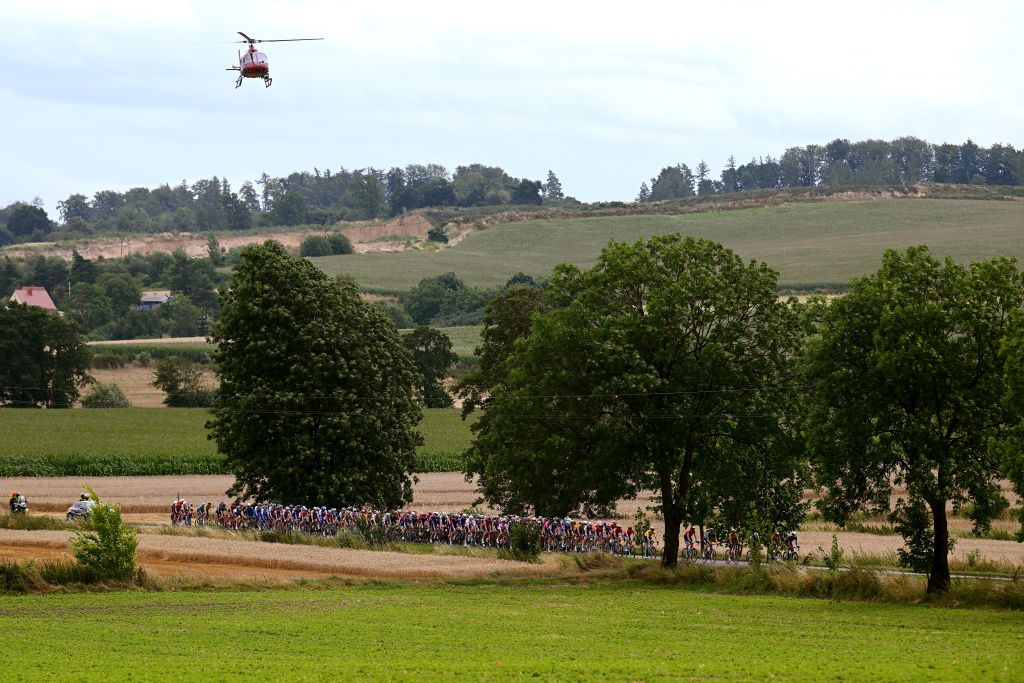 OPOLE POLAND AUGUST 01 A general view of the peloton passing through a landscape during the 80th Tour de Pologne 2023 Stage 4 a 1991km stage from Strzelin to Opole UCIWT on August 01 2023 in Opole Poland Photo by Dario BelingheriGetty Images