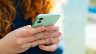 A woman checking her smartphone