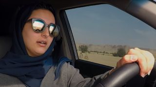 A woman learning to drive in Saudi Women's Driving School