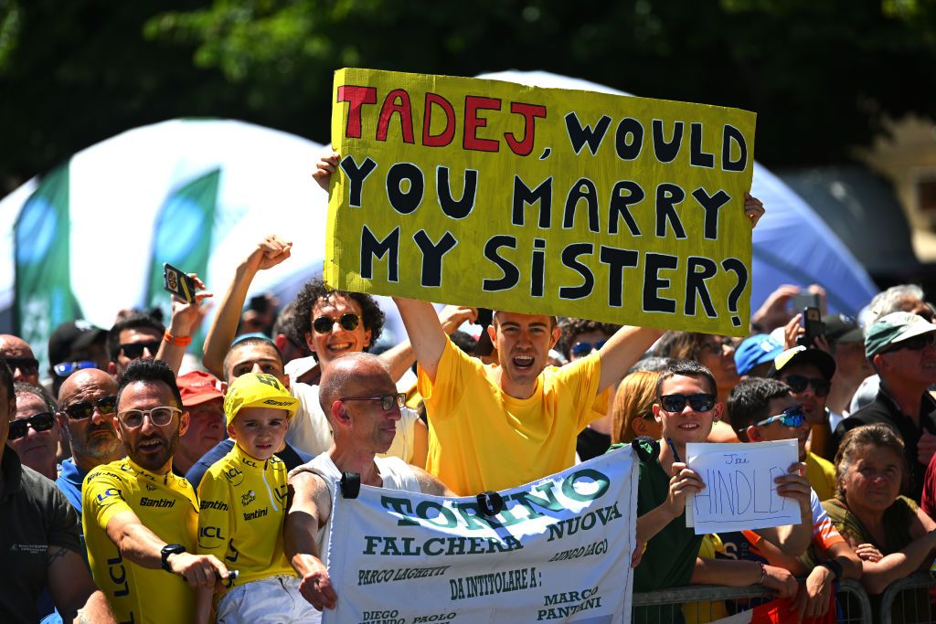 PINEROLO ITALY JULY 02 Fans of Tadej Pogacar of Slovenia and UAE Team Emirates prior to the 111th Tour de France 2024 Stage 4 a 1394km stage from Pinerolo to Valloire UCIWT on July 02 2024 in Pinerolo Italy Photo by Dario BelingheriGetty Images