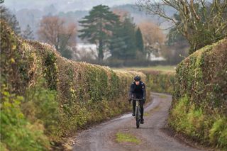Image shows a rider cycling at the weekend