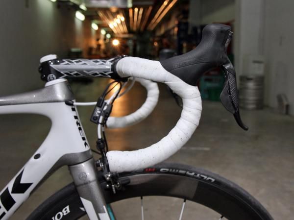 Andy Schleck (LEOPARD TREK) runs the Dura-Ace Di2 levers high on his Bontrager Race Lite VR bar with the reach shortened up a bit so he can still brake easily from the drops.