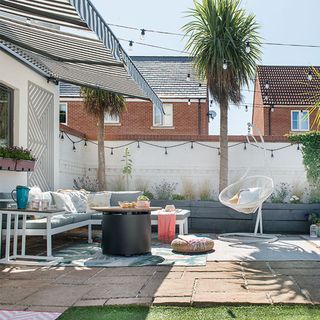 garden area with sofa and plants