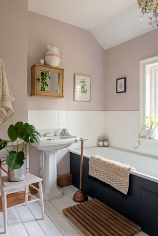 bathroom in Georgian home with painted floorboards